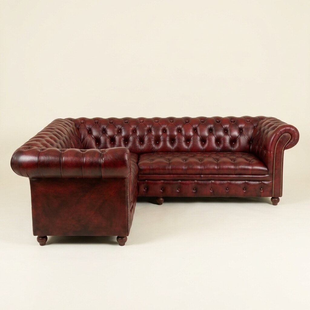 The Oakmere Corner, Tufted Bench seat, in Oxblood Red leather, front three-quarter angle